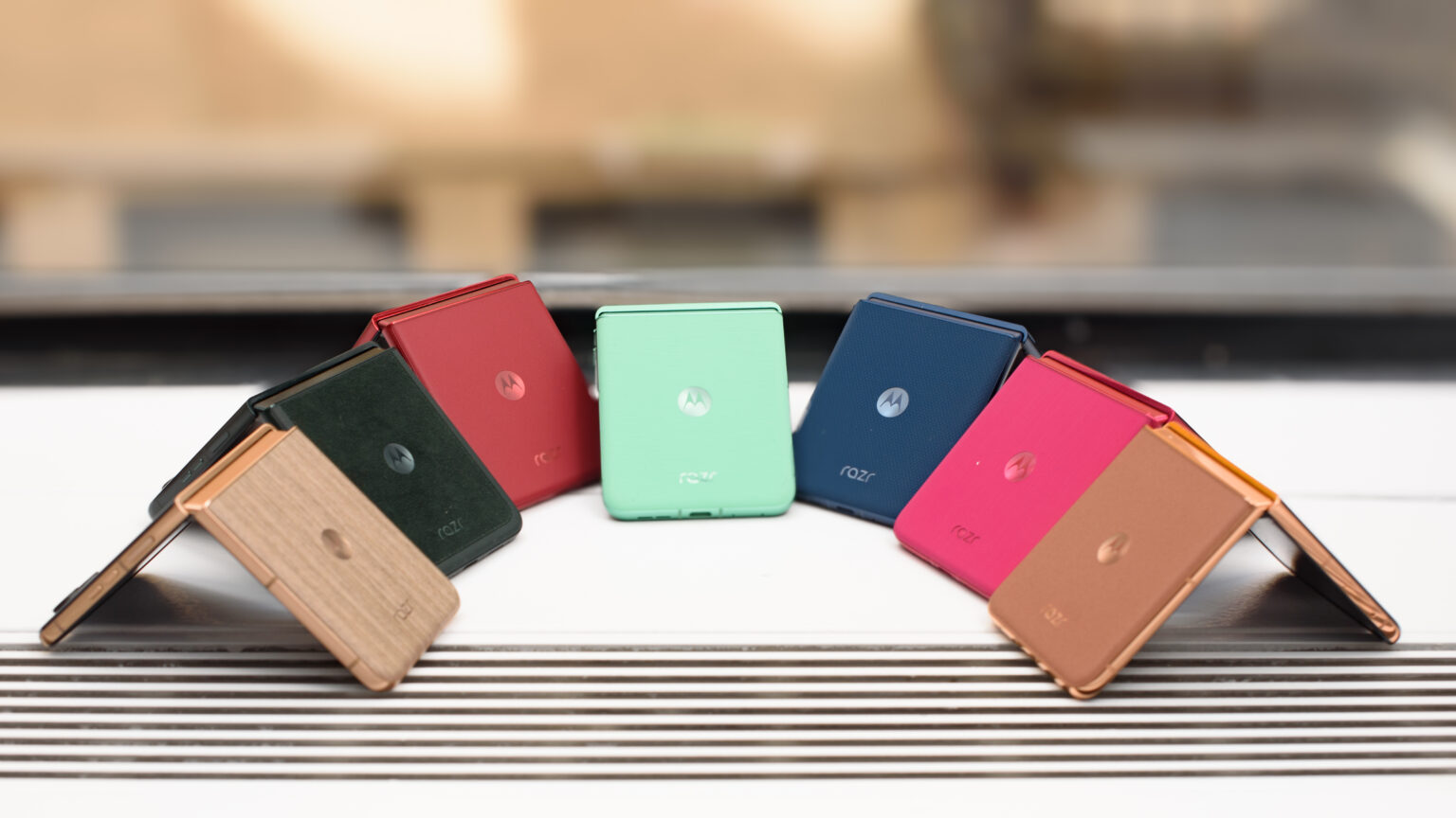 motorola-razr ultra 2025-folding phone-AI features-wooden panel