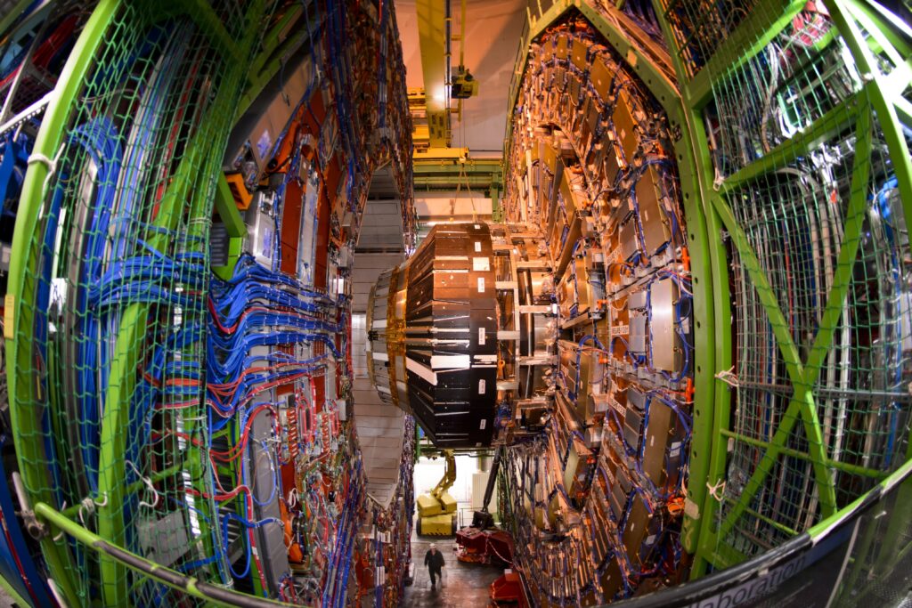 top quark-quark-gluon plasma-Big Bang-Large Hadron Collider-cosmology