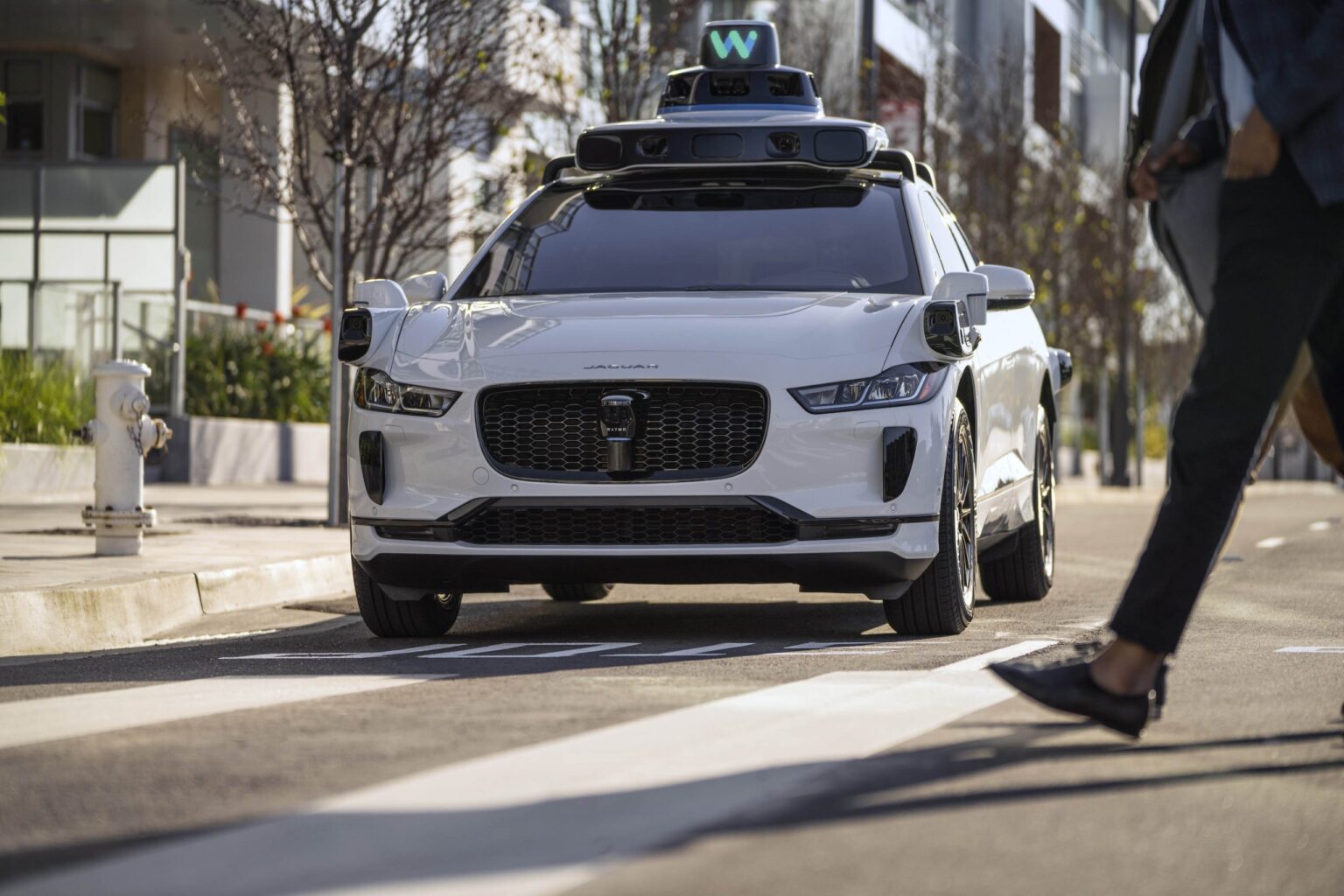 Waymo-self-driving cars-Tesla-Cybercab-Jaguar I-Pace-robotic taxis